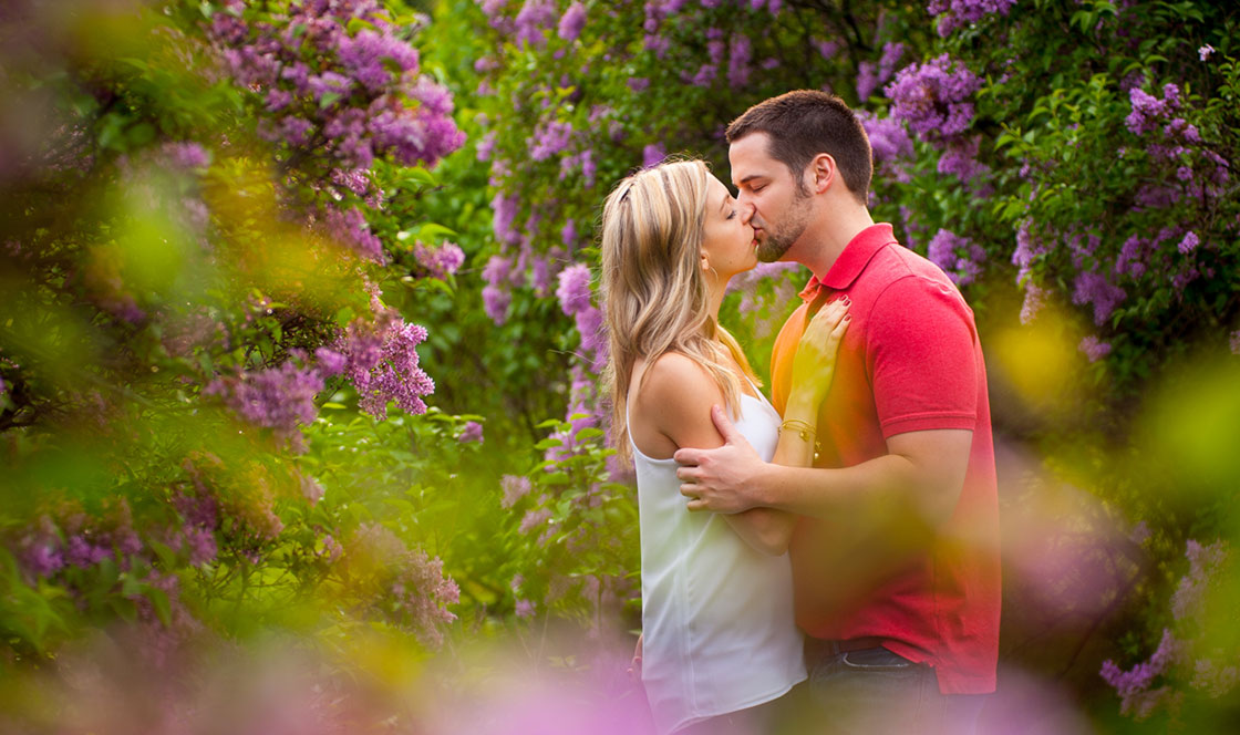 couple among Lilacs in bloom 
